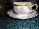 Haviland Limoges tea cup and saucer, heavy gold trim