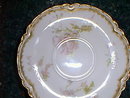 Haviland Limoges tea cup and saucer, heavy gold trim