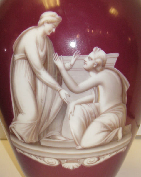 Pair of Red Porcelain Vases with Neoclassical Figural Decoration