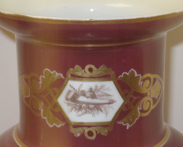 Pair of Red Porcelain Vases with Neoclassical Figural Decoration