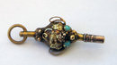 19th Century Gold Urn shaped Watch Key with Grape and Vine Decoration