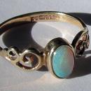 English Opal Dress Ring with scrolled shoulders