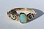 English Opal Dress Ring with scrolled shoulders