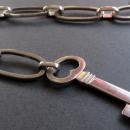 Silver Belt with Padlock and Key Charms by deigner Old Florence
