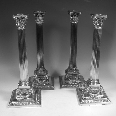 set of four candlesticks