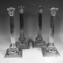 set of four candlesticks