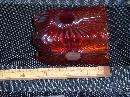 Circa 1886 most unusual RIBBED + BULLSEYE + FOOTED AMBERINA Glass toothpick holder , research indicates C.1886 Ribbed effect on outer surface, Reverse Bullseye each at different height on panels. Footed.