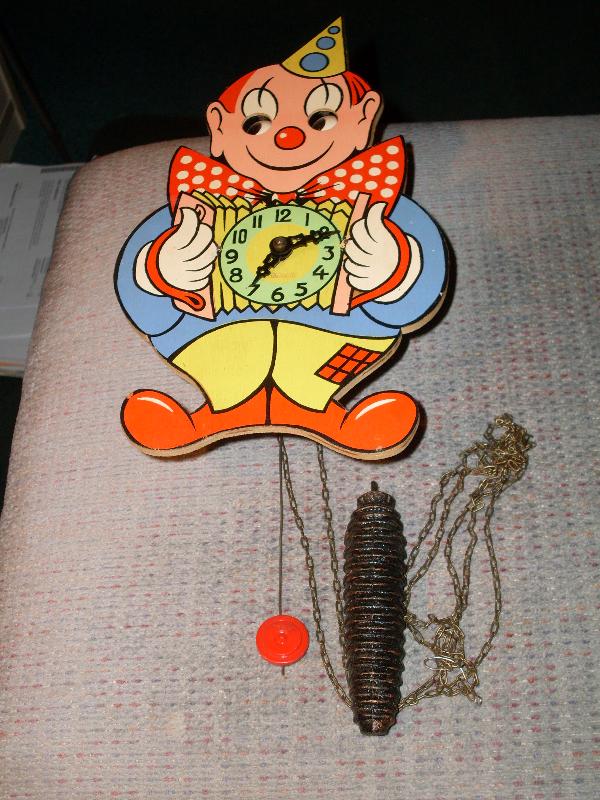 Vintage Germany Wind-up CLOWN Wall CLOCK _ wooden construction_ pendulum_weight