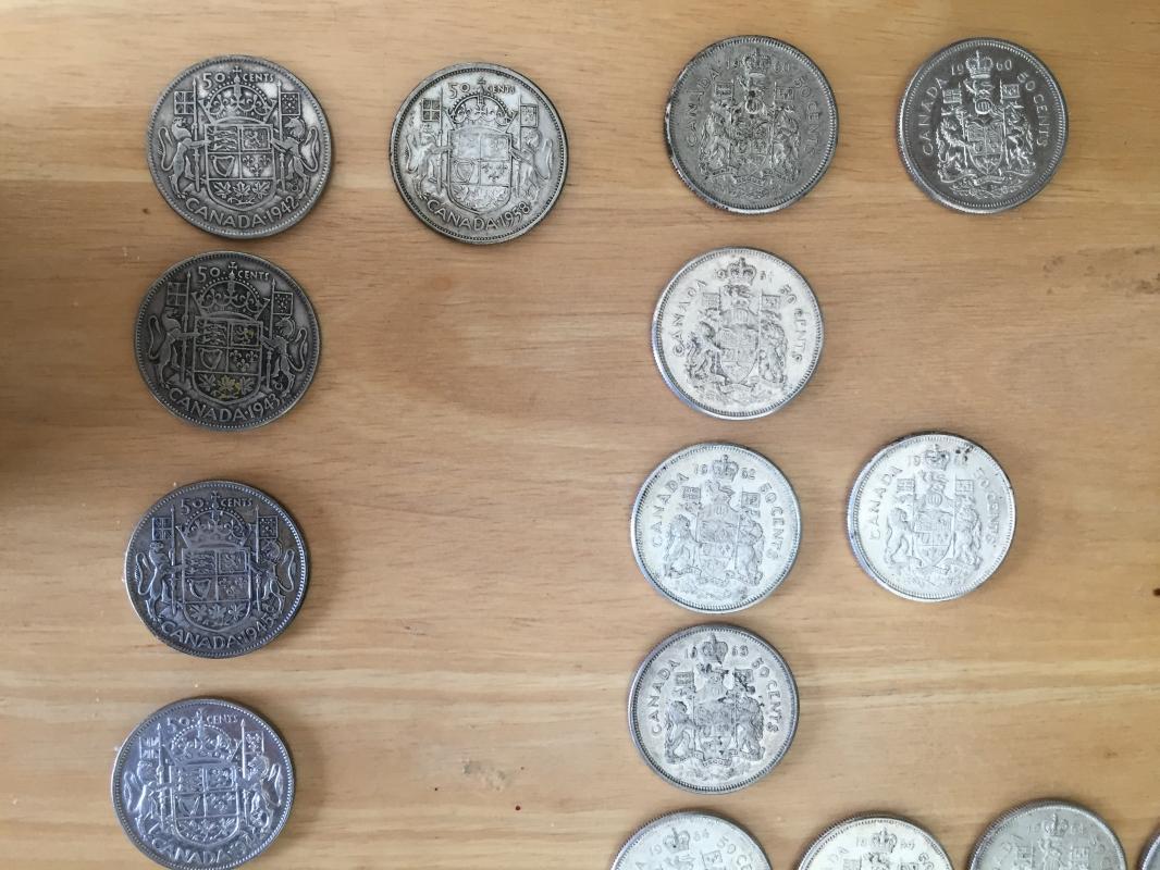 80% SOLID SILVER _ Lot of 23 CANADA half dollars _50 Cent pieces_ Condition FINE to Extra Fine_ YEARS 1942- 1966_ mixed_ First Time on Market
