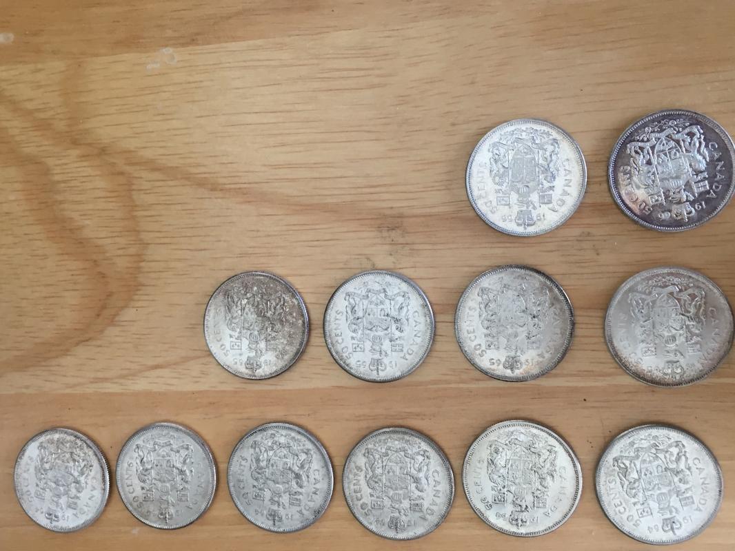 80% SOLID SILVER _ Lot of 23 CANADA half dollars _50 Cent pieces_ Condition FINE to Extra Fine_ YEARS 1942- 1966_ mixed_ First Time on Market