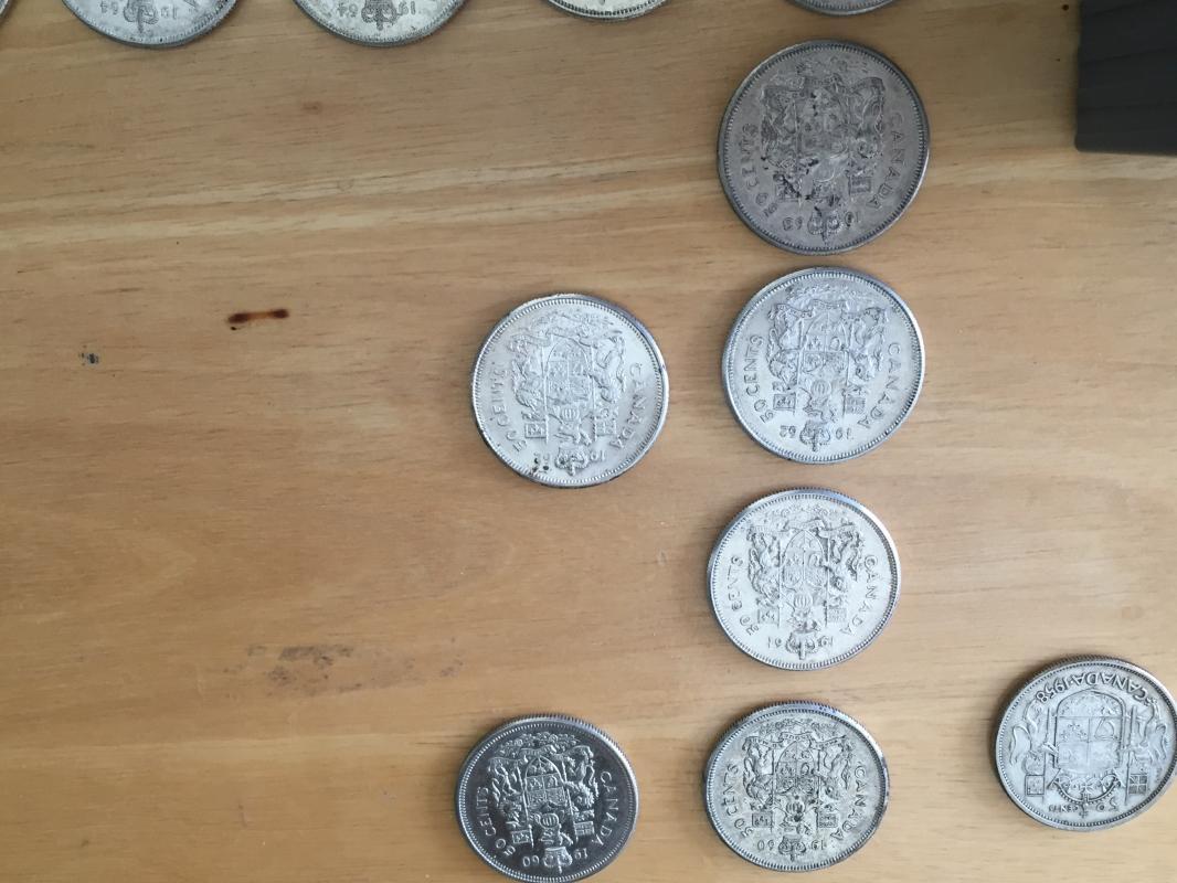 80% SOLID SILVER _ Lot of 23 CANADA half dollars _50 Cent pieces_ Condition FINE to Extra Fine_ YEARS 1942- 1966_ mixed_ First Time on Market
