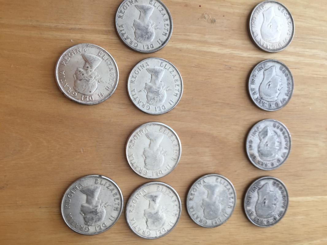 80% SOLID SILVER _ Lot of 23 CANADA half dollars _50 Cent pieces_ Condition FINE to Extra Fine_ YEARS 1942- 1966_ mixed_ First Time on Market