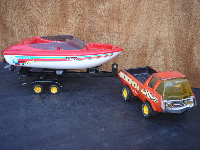 Collectible TONKA Pick-up Truck Pressed Steel with TONKA Boat Trailer and Nylint Brand Plastic Boat