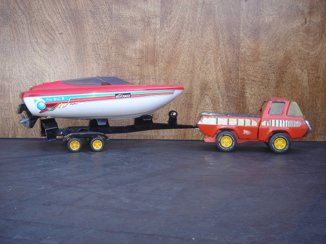 Collectible TONKA Pick-up Truck Pressed Steel with TONKA Boat Trailer and Nylint Brand Plastic Boat