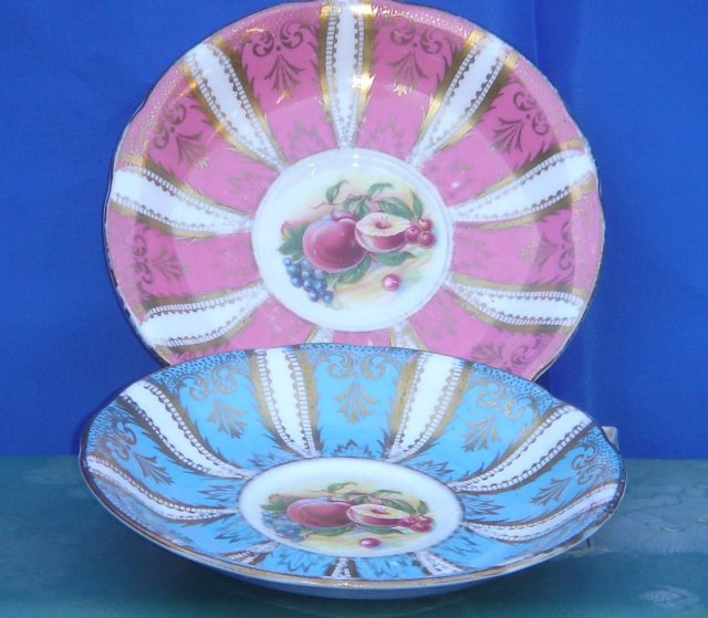 Collectible Beautiful PARAGON Saucers. ONE IN PINK and ONE in BLUE with Fruit in Center.