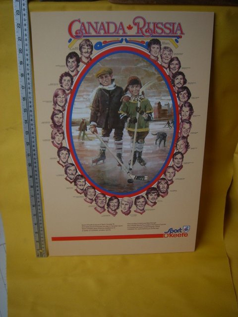 Professionally DRY MOUNTED POSTER ART _Sports Memorabilia Vintage 1974 Team CANADA vs Russia HOCKEY Poster Features Paul Henderson # 19 Team Canada etc AND One Canada Russia Mini WOODEN HOCKEY STICK_ Professionally Dry Mounted_ Size 23