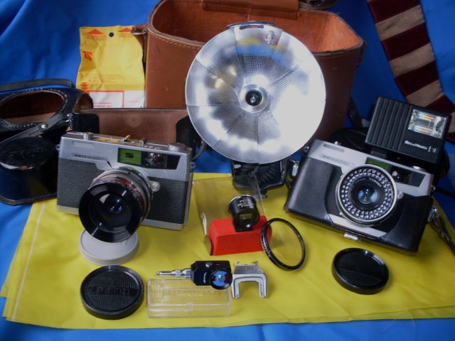 Camera Collector / Camera Buffs Still Make Use __TWO _ 2 _ Petri 7s- 1963 JAPAN Rangefinder Cameras CIRCLE-EYE Green System Cameras + Case & Lots of attachments