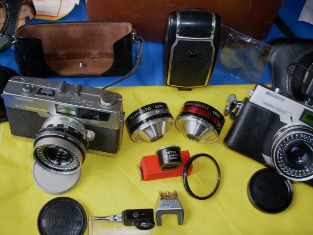 Camera Collector / Camera Buffs Still Make Use __TWO _ 2 _ Petri 7s- 1963 JAPAN Rangefinder Cameras CIRCLE-EYE Green System Cameras + Case & Lots of attachments