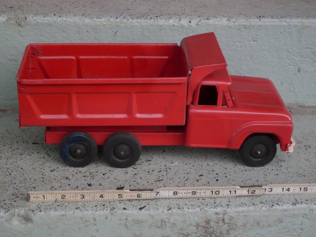 Toys PRESSED STEEL 1950's NYLINT Toys Red Dump Truck with Genuine Rubber Wheels _ 15 1/2 Inches Widest