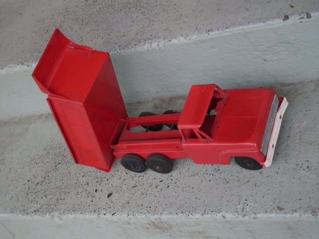 Toys PRESSED STEEL 1950's NYLINT Toys Red Dump Truck with Genuine Rubber Wheels _ 15 1/2 Inches Widest