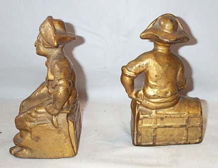 Pair Of Gilded Cast Iron Book Ends