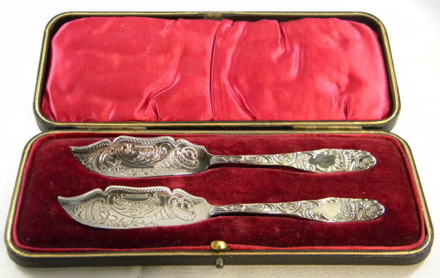 Heavily Engraved Victorian Silver Butter Knives, boxed 1897