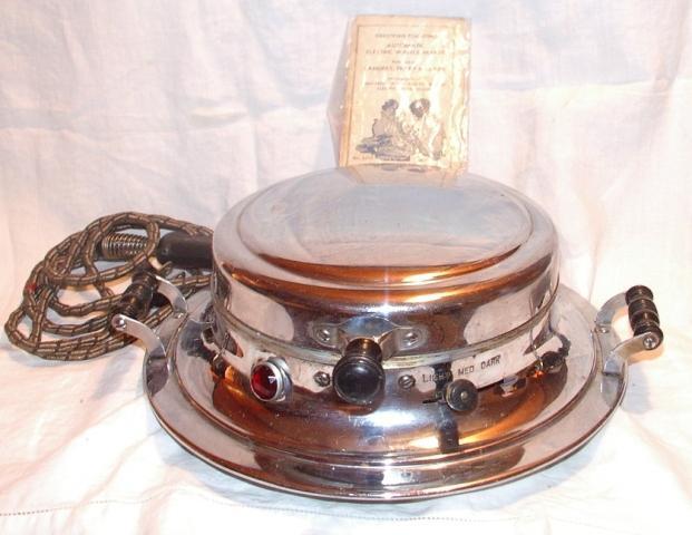 Universal Wafflemaker Model E7124X Ruby Red Light