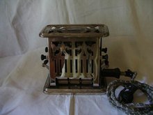 Antique Electric Toaster by Universal Ebony