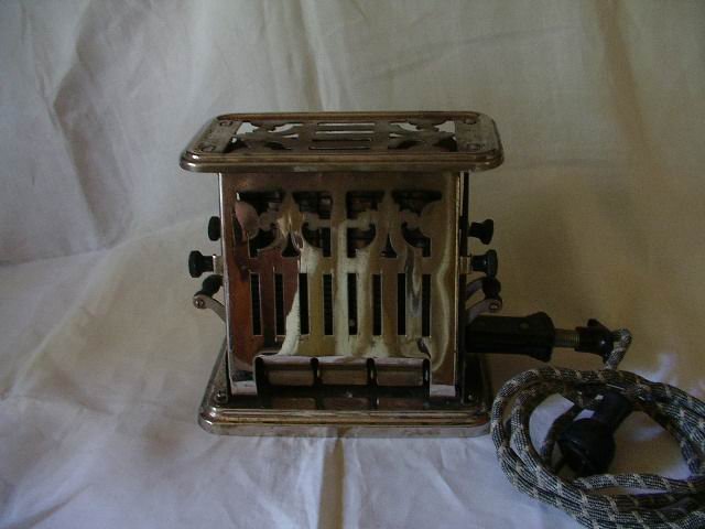 Antique Electric Toaster by Universal Ebony