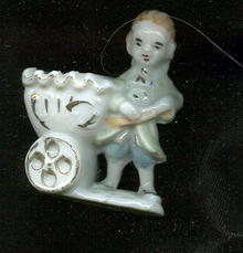 Stafforshire Figure w/Cart Match Holder