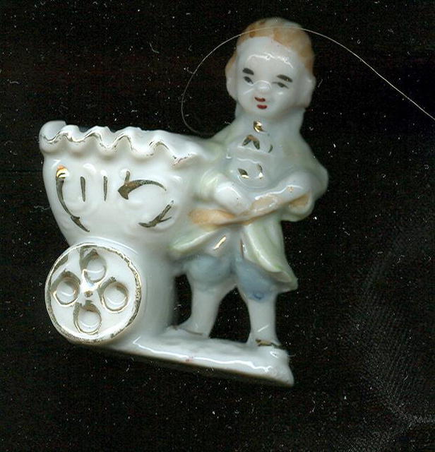 Stafforshire Figure w/Cart Match Holder