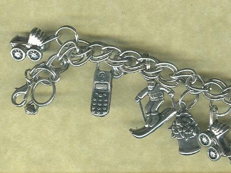 Silver Charm Bracelet w/ 14 Assorted Charms Included
