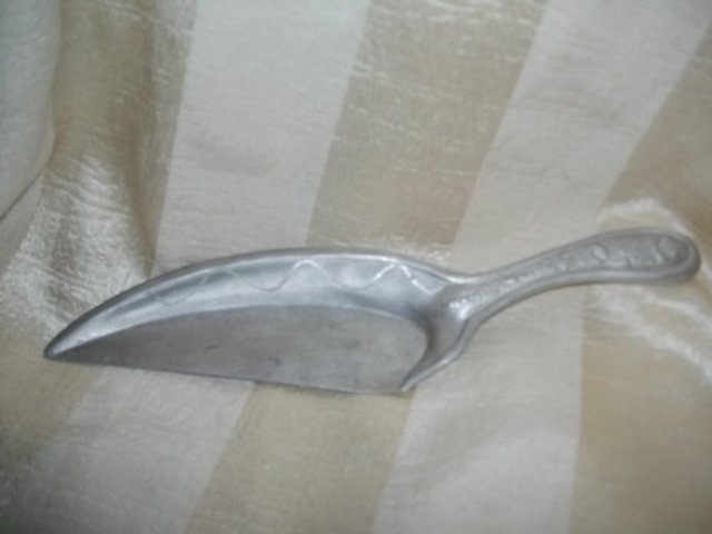 Vintage Stamped Aluminum Serving Utensil