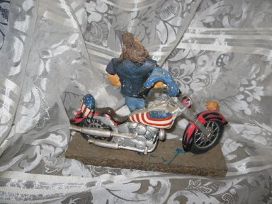 Americana Chopper Motorcycle & Biker Dude