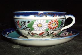 Lusterware Porcelain Cup and Saucer