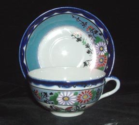 Lusterware Porcelain Cup and Saucer