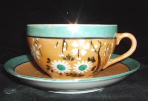 Japanese Takito, Luster Glaze Handpainted Cup and Saucer