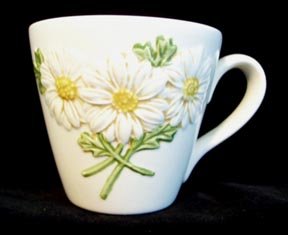 Metlox Poppytrail Sculptured Daisey Cup and Saucer