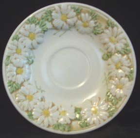Metlox Poppytrail Sculptured Daisey Cup and Saucer