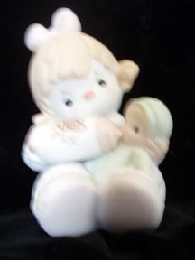 Can't Get Enough of Our Club Precious Moments Figure
