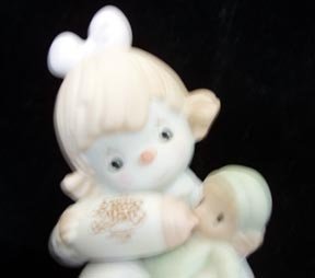 Can't Get Enough of Our Club Precious Moments Figure