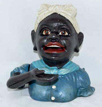 SMALL BLACK GIRL MECHANICAL BANK CAST IRON