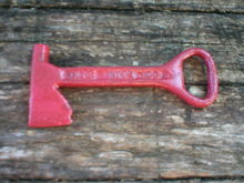 RED AXE BOTTLE OPENER MARKED DIXIE BEER CAST IRON