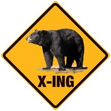 BEAR X-ING EMBOSSED METAL SIGN
