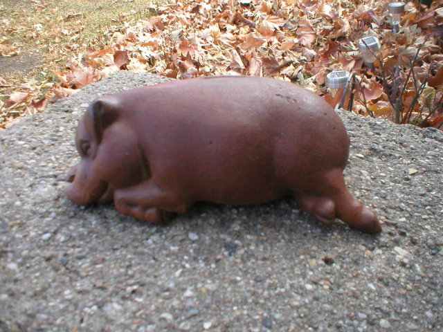 HAPPY SLEEPING DREAMING CAST IRON PIG BANK