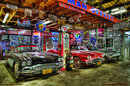 SIDEVIEW OF THREE CORVETTES HEAVY METAL SIGN