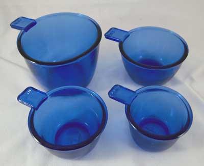 ONE SET FOUR COBALT MEASURING CUPS