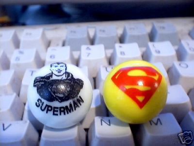 TWO SUPERMAN GLASS LOGO MARBLES