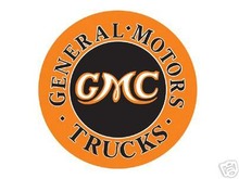 GMC TRUCKS ROUND TIN SIGN