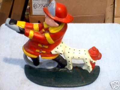 FIREMAN DALMATION DOORSTOP CAST IRON